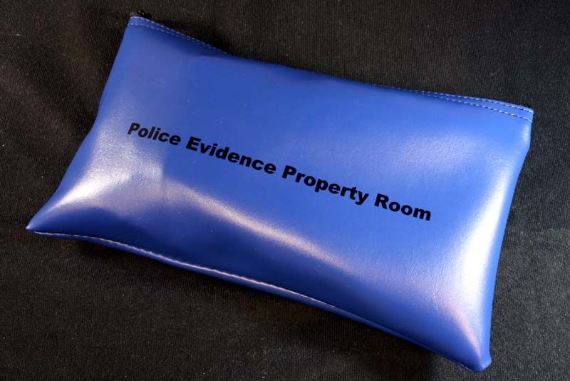 POLICE EVIDENCE BAG FILLED WITH COIN COLLECTION  