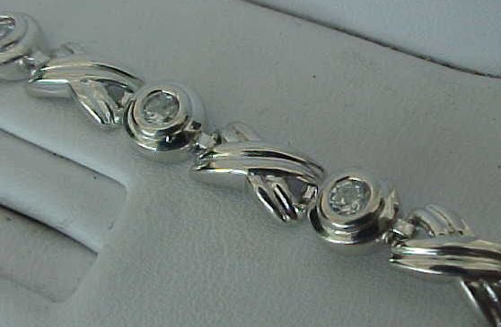 65ctTW Hugs & Kisses CZ Textured Rhodium STERLING SILVER Bracelet (7 