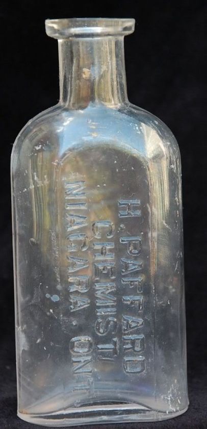   Embossed Glass Medicine BOTTLE Chemist NIAGARA ONTARIO CANADA  